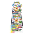 A display stand filled with Pokémon TCG booster packs featuring Eevee, with the Pokémon logo and Japanese text visible on the packaging.