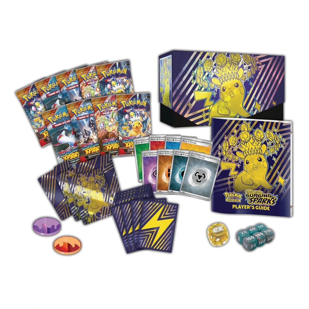 Pokémon trading card game set with cards, guidebook, and dice on a white background